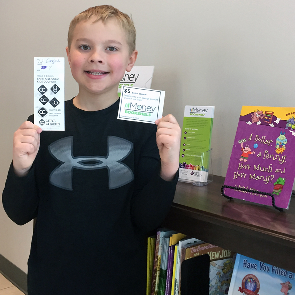 Boy showing his completed bookmark