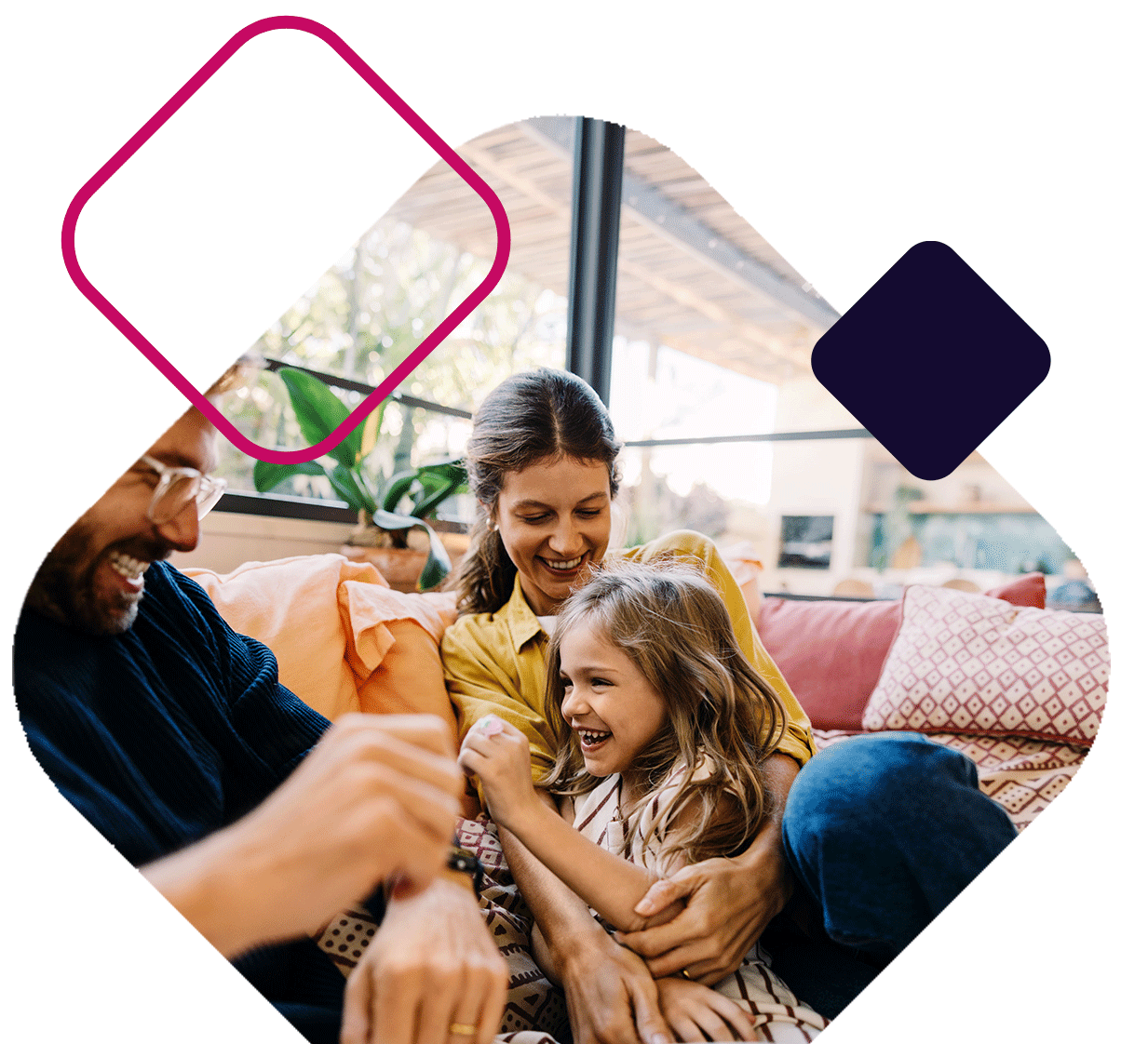 Laughing Family On Couch