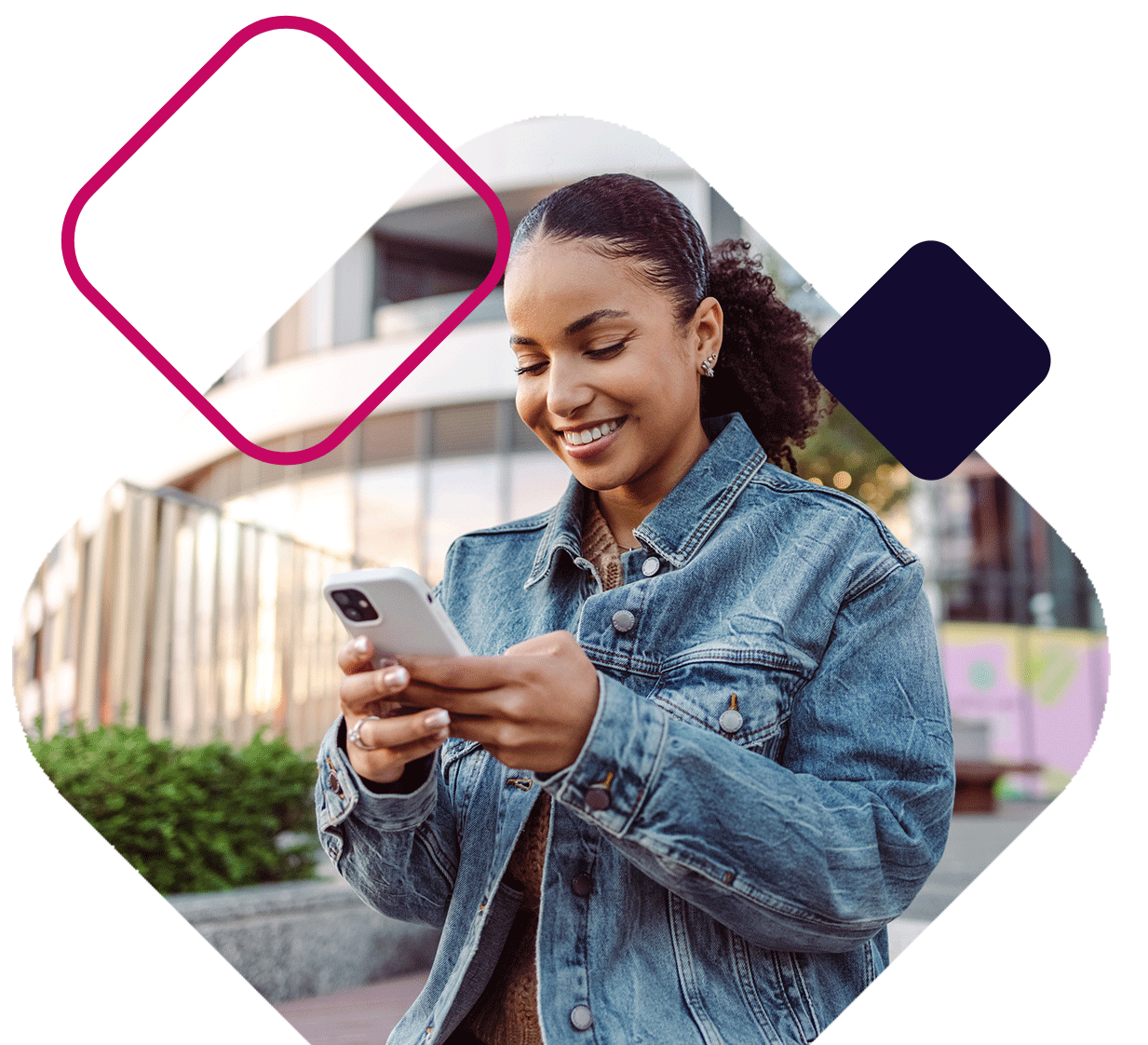 Smiling Woman Looks At Phone