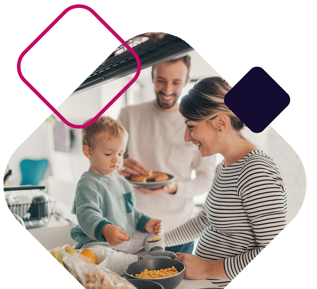 Young Family In Kitchen