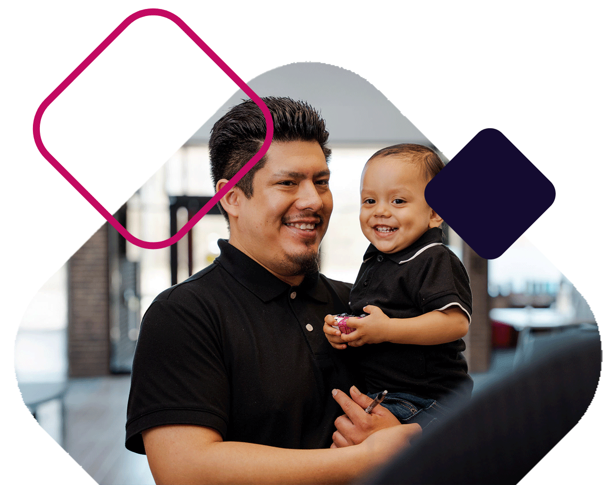 Dad Holding Young Son