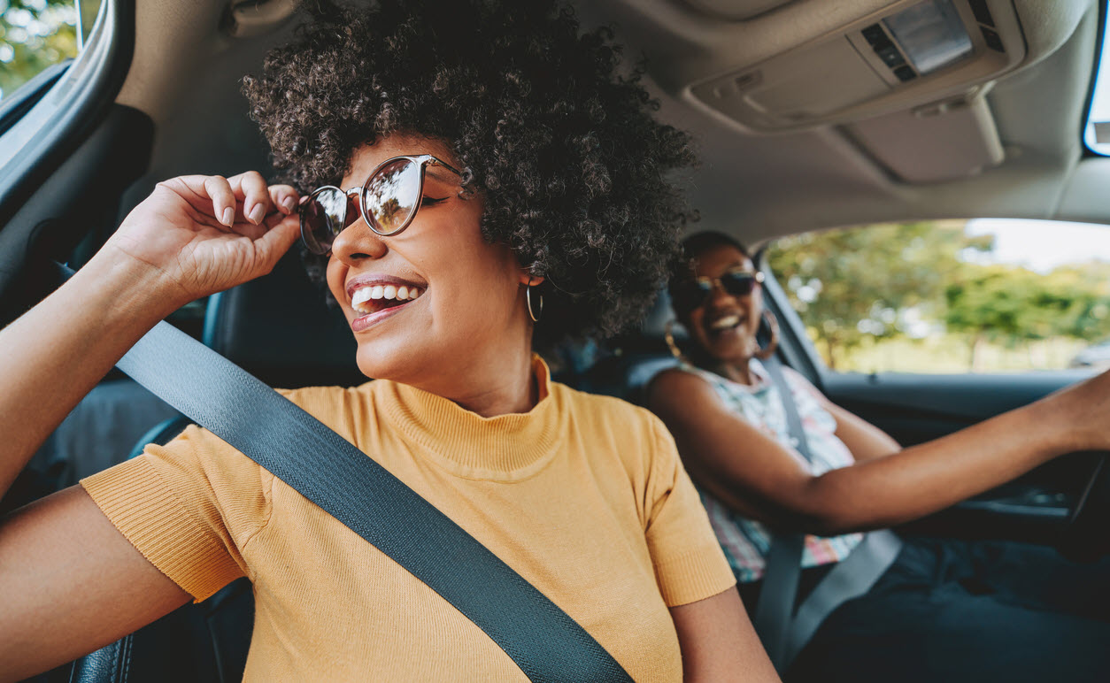 Smiling Woman In Passenger Seat