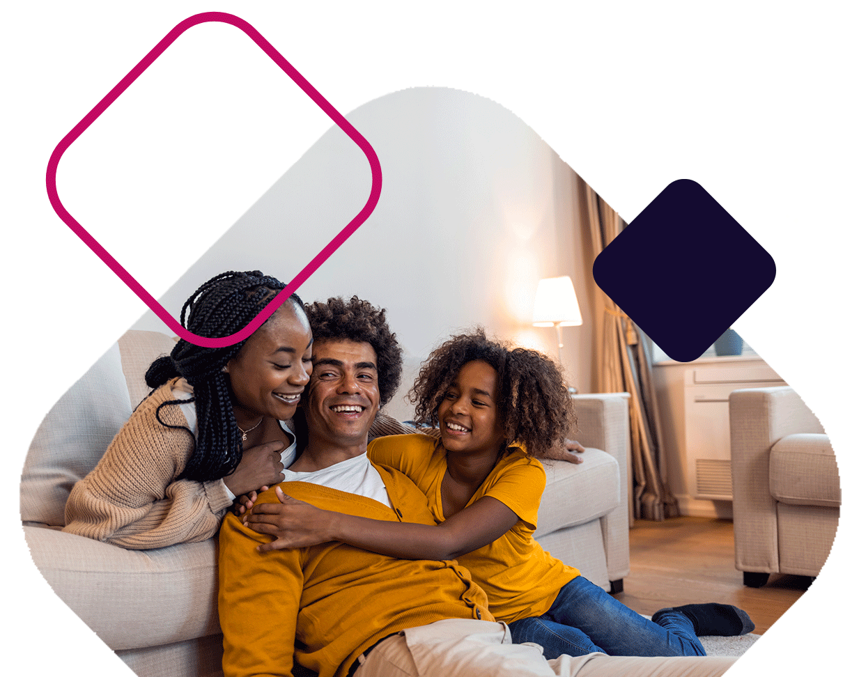 Smiling Family By Couch