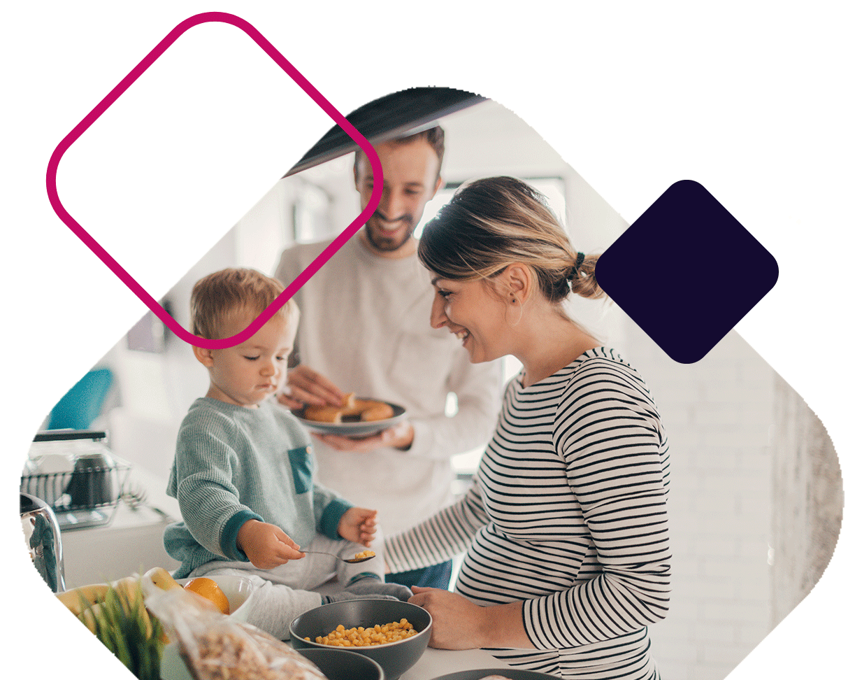 Young Family In Kitchen