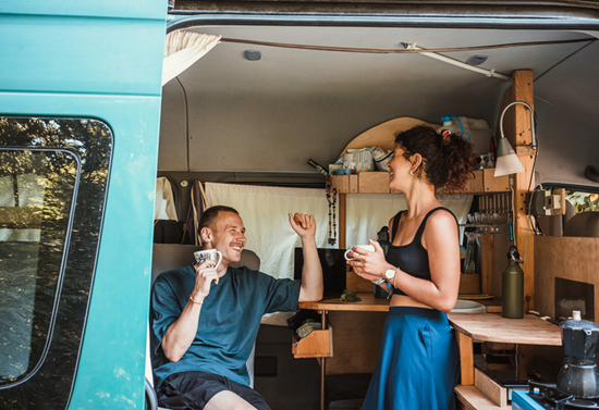 Couple In Camper Van