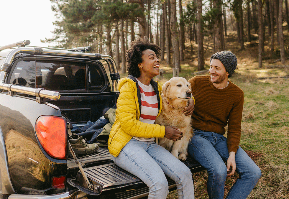 Couple Outdoors With Dog