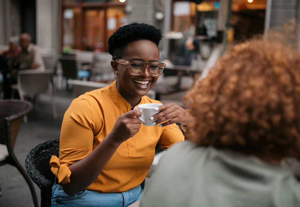 Smiling Woman In Cafe