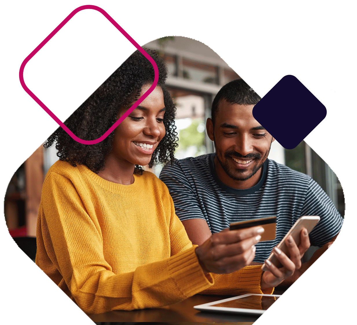 Couple Looking At Credit Card