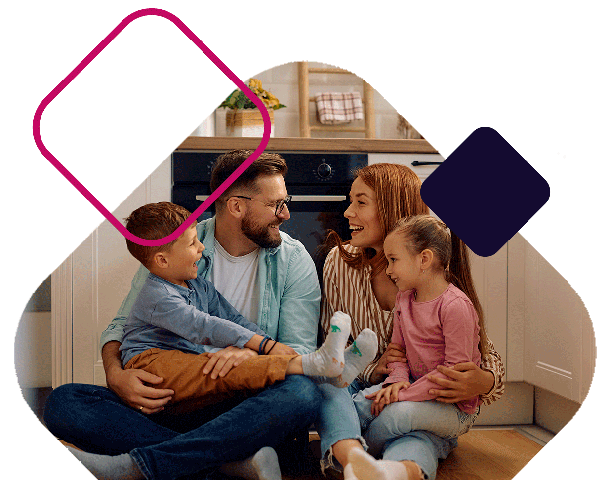 Family Smiling Together in the Kitchen