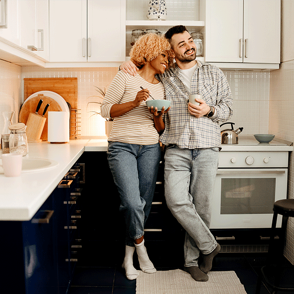 Couple in their kitchen