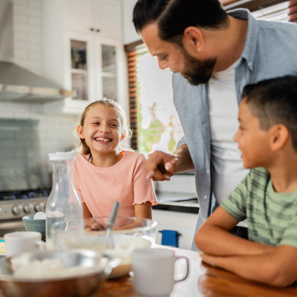Father baking with children