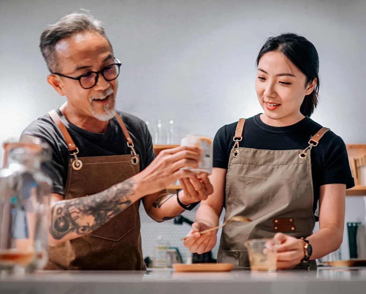 Business employees working at counter
