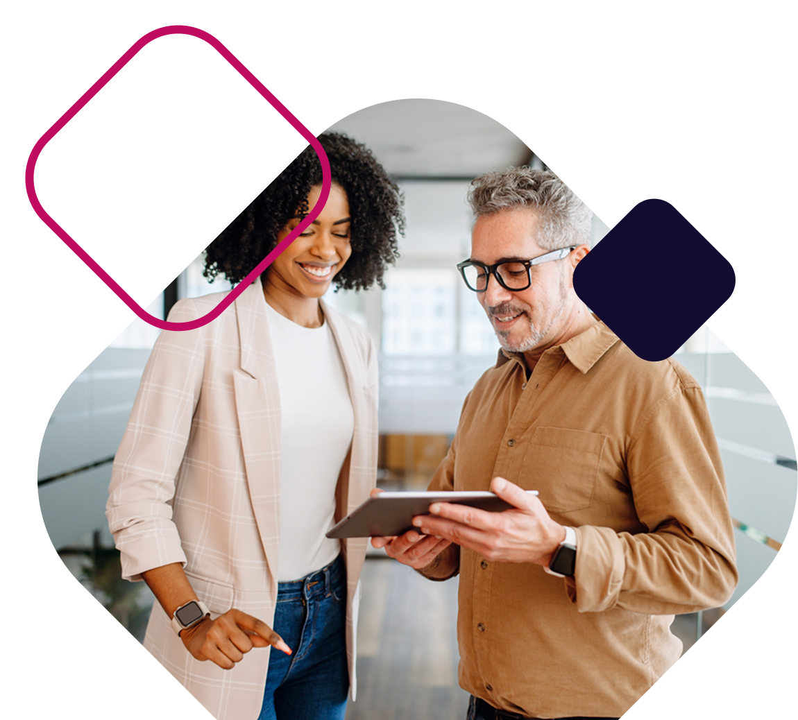 Consulting Business Owners On Tablet