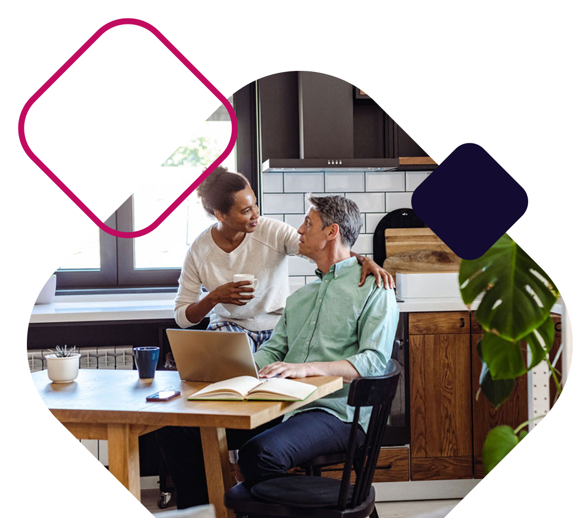 Older Couple In Renovated Kitchen