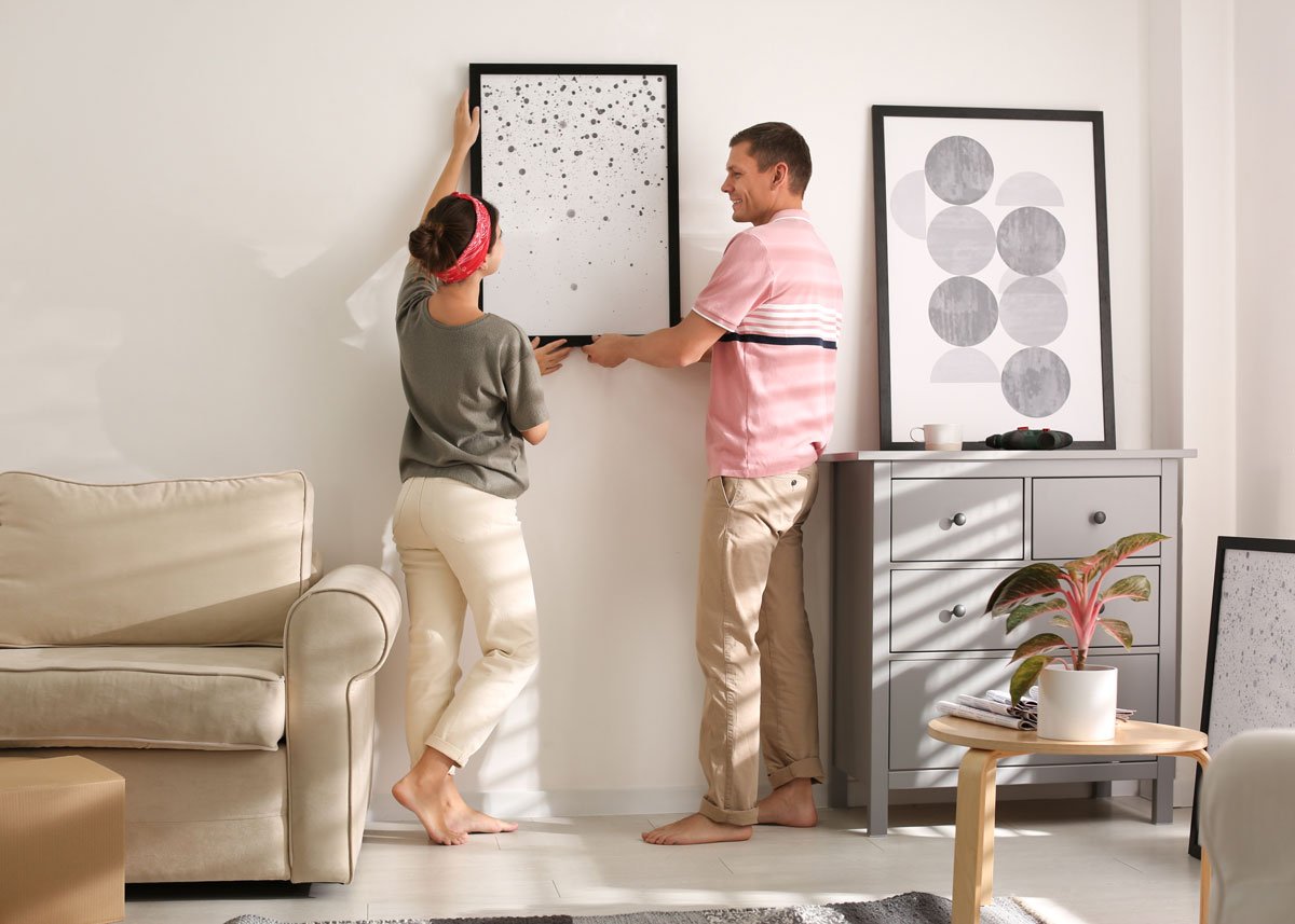 Couple Decorating New Home