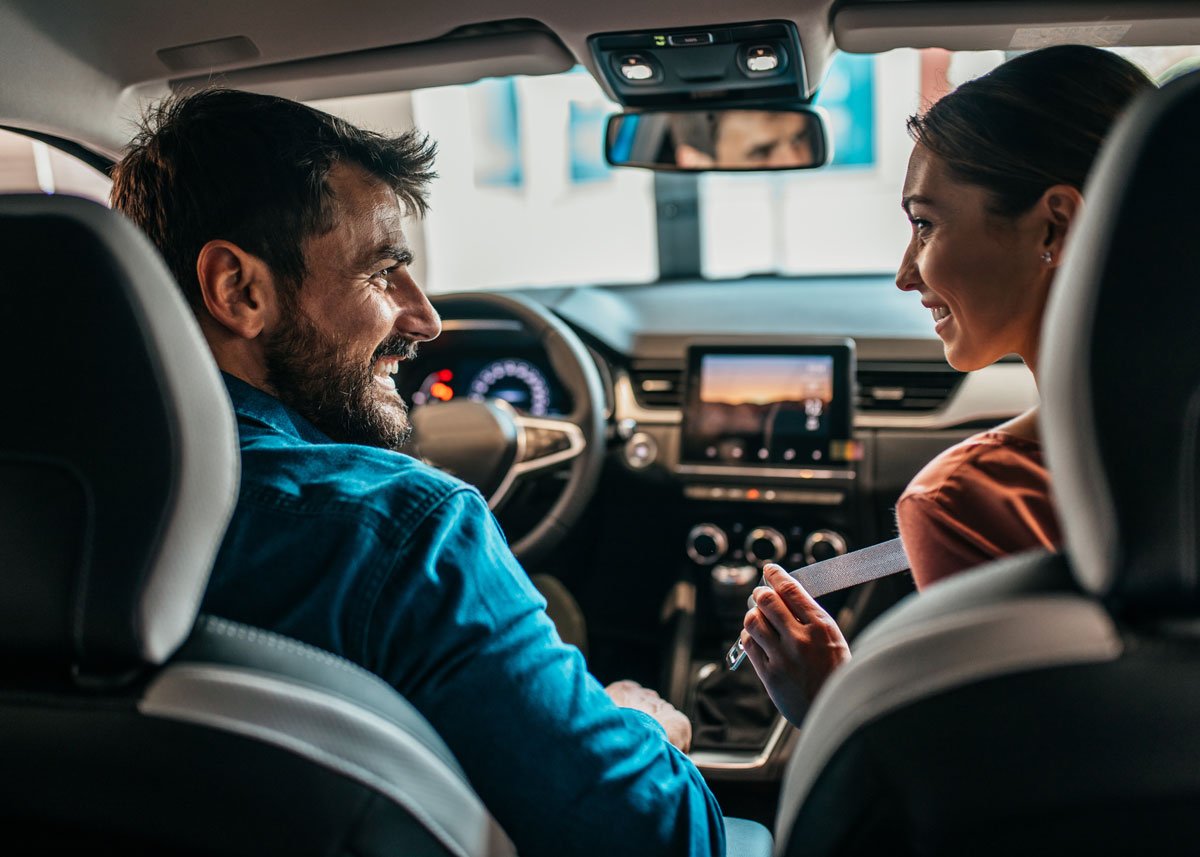 Couple Inside Car Test Driving