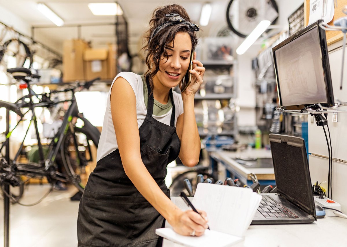 shop owner on phone