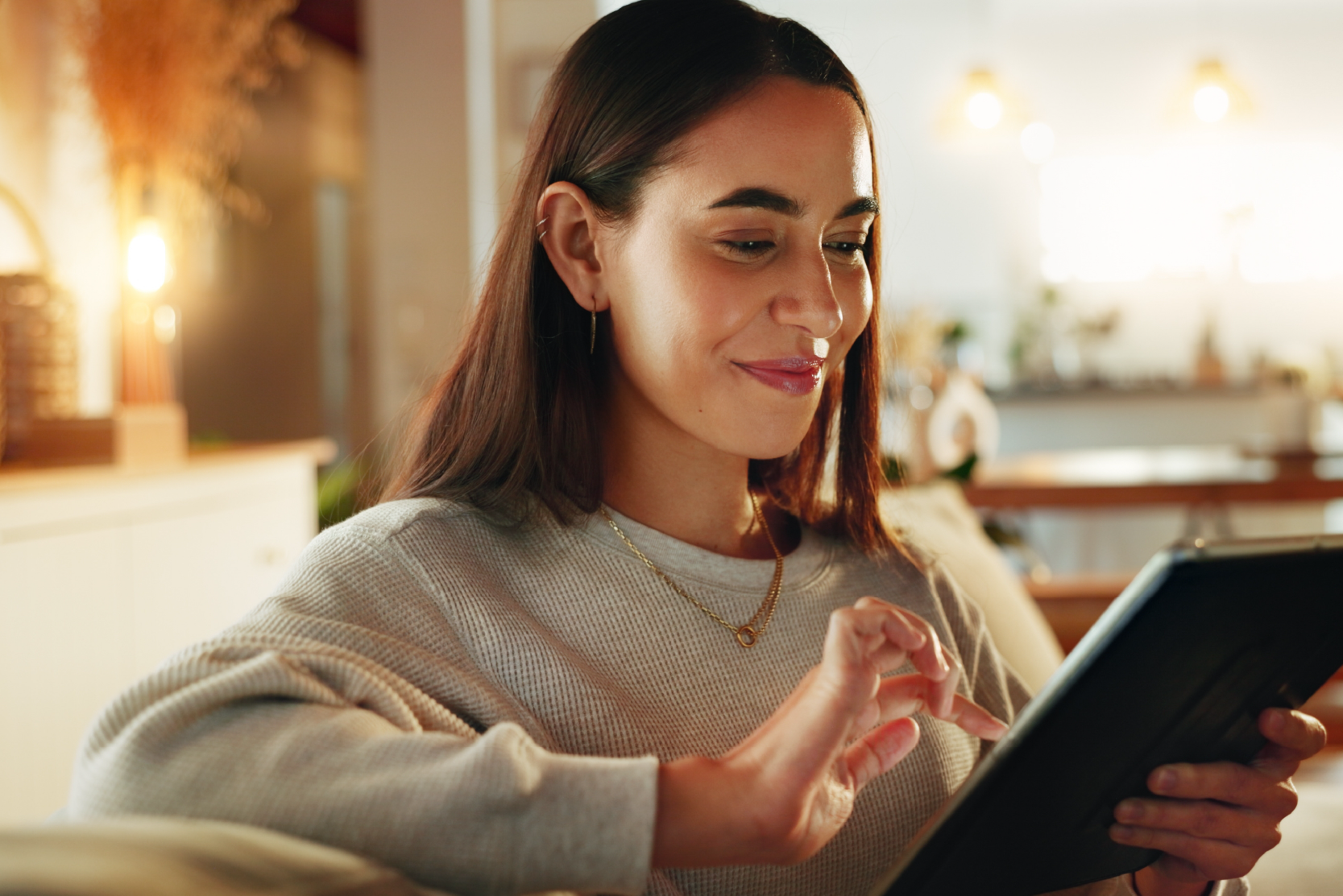 Woman looking at tablet