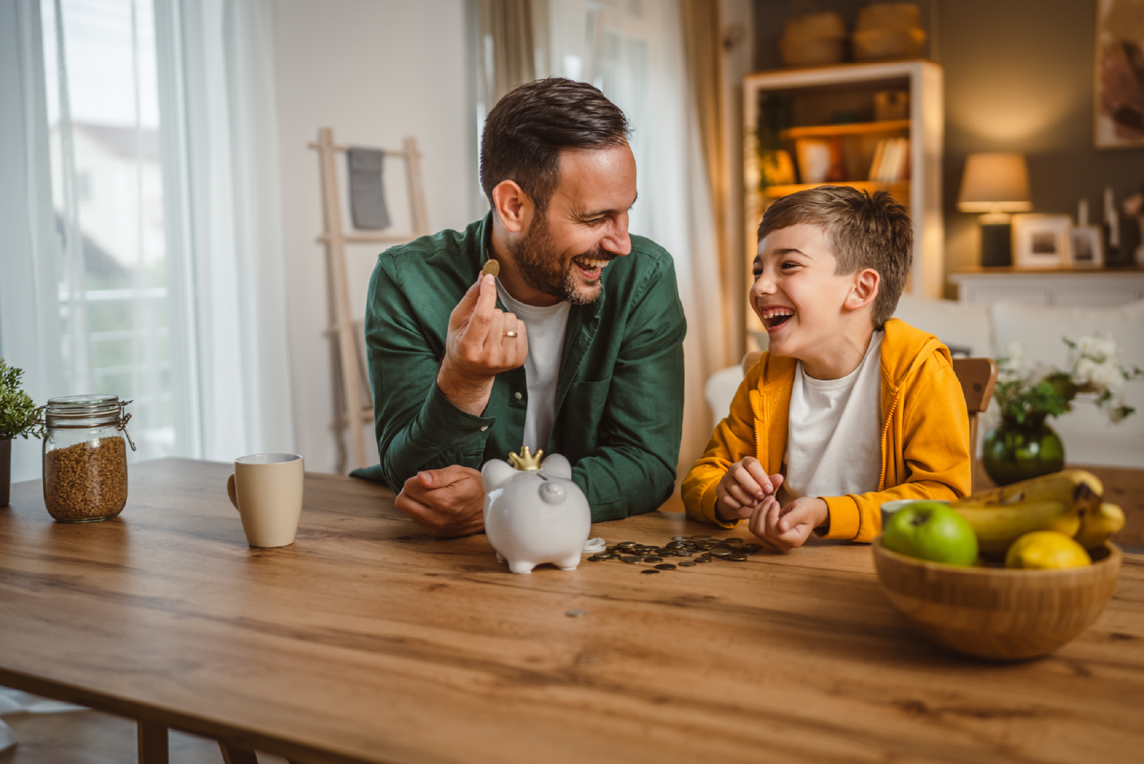 Father and son with piggybank