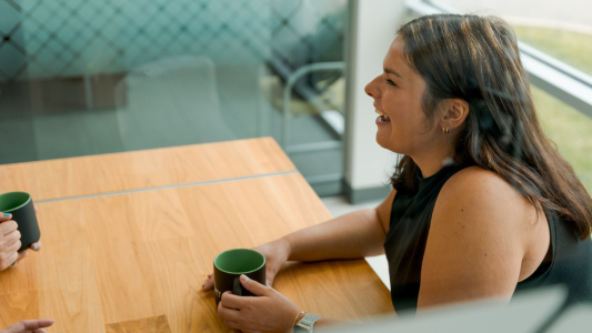 Female Drinking Coffee In Branch