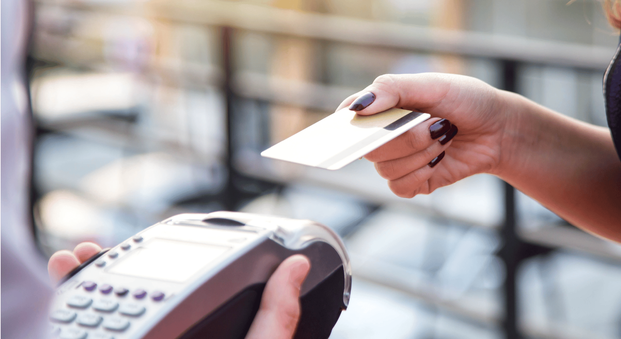 Woman swiping card